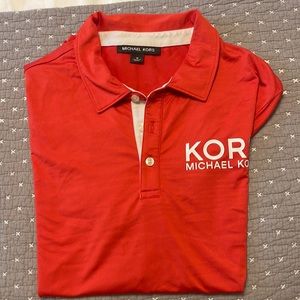 Micheal Kors golf Shirt . Size M. Previously owned